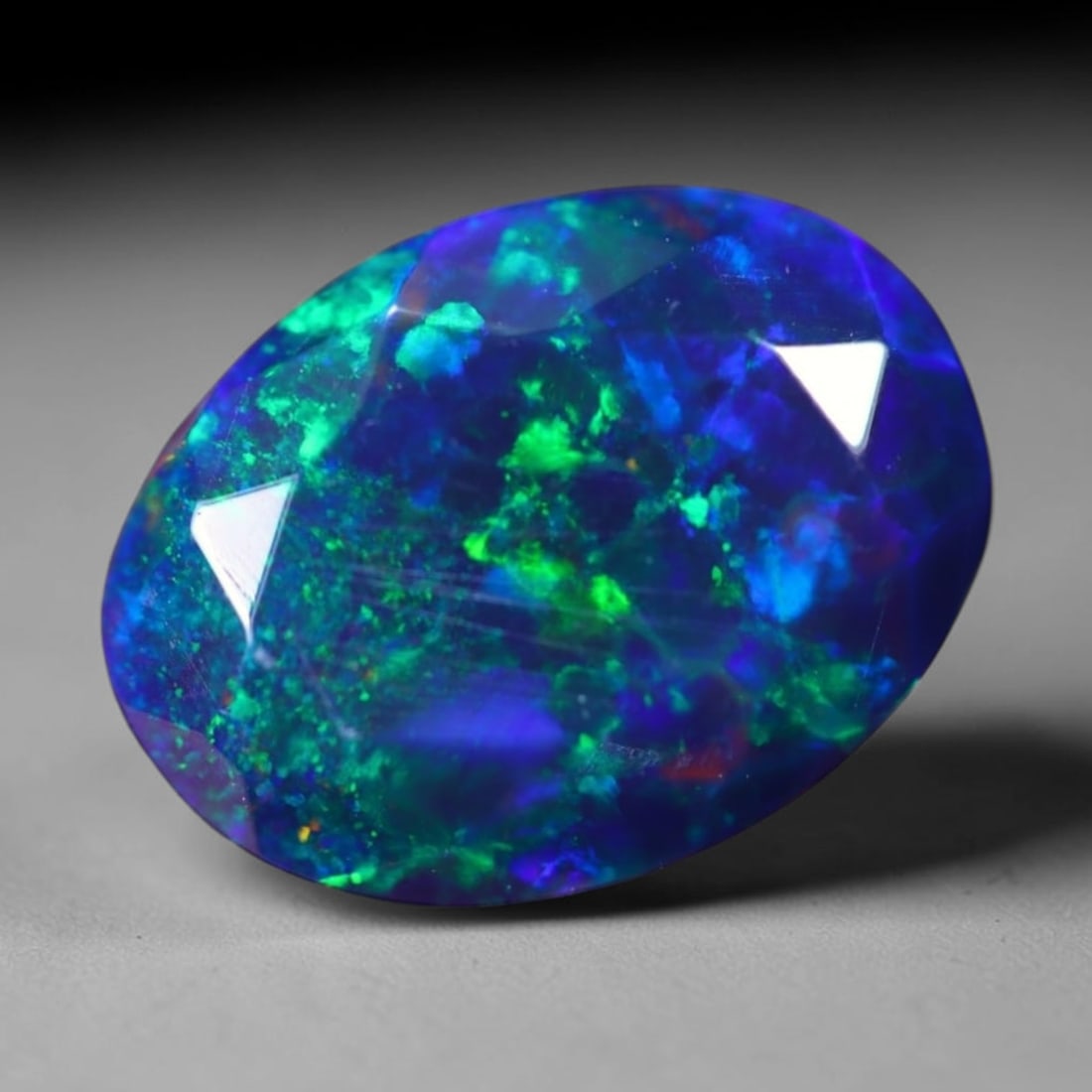 1.97Ct Welo Black Faceted Opal Polished - Ethiopian Opal , 445E: Ksmith Heritage Auctioneers Subject: Natural Ethiopian Welo Black Opal Origin: Ethiopia Carat Weight: 1.97Ct Dimension: 10.1x7.7x5.3 mm Treatment: Smoked Type: Faceted, Po