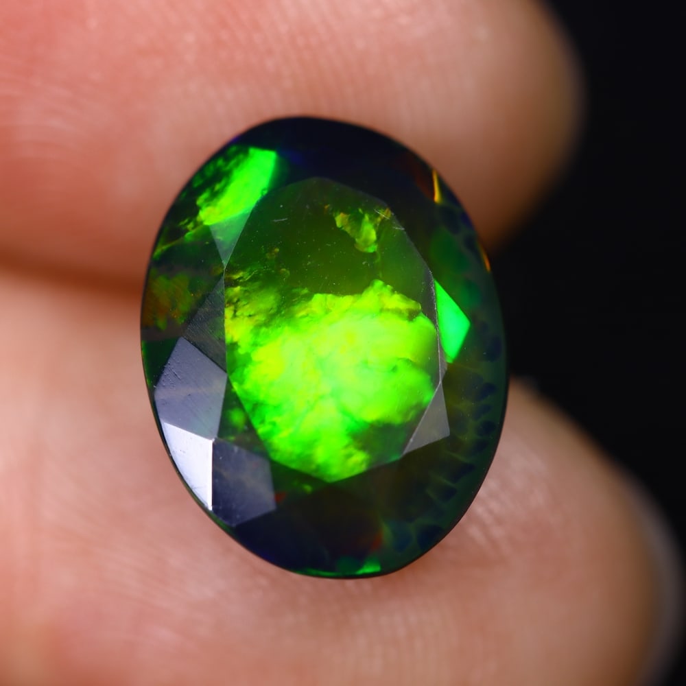 3.59Ct Ethiopian Black Smoked Opal, Faceted Cut - 13.5x10.3x6.0 mm , 628C: Ksmith Heritage Auctioneers Subject: Natural Ethiopian Welo Opal Origin: Ethiopia Treatment: Smoked