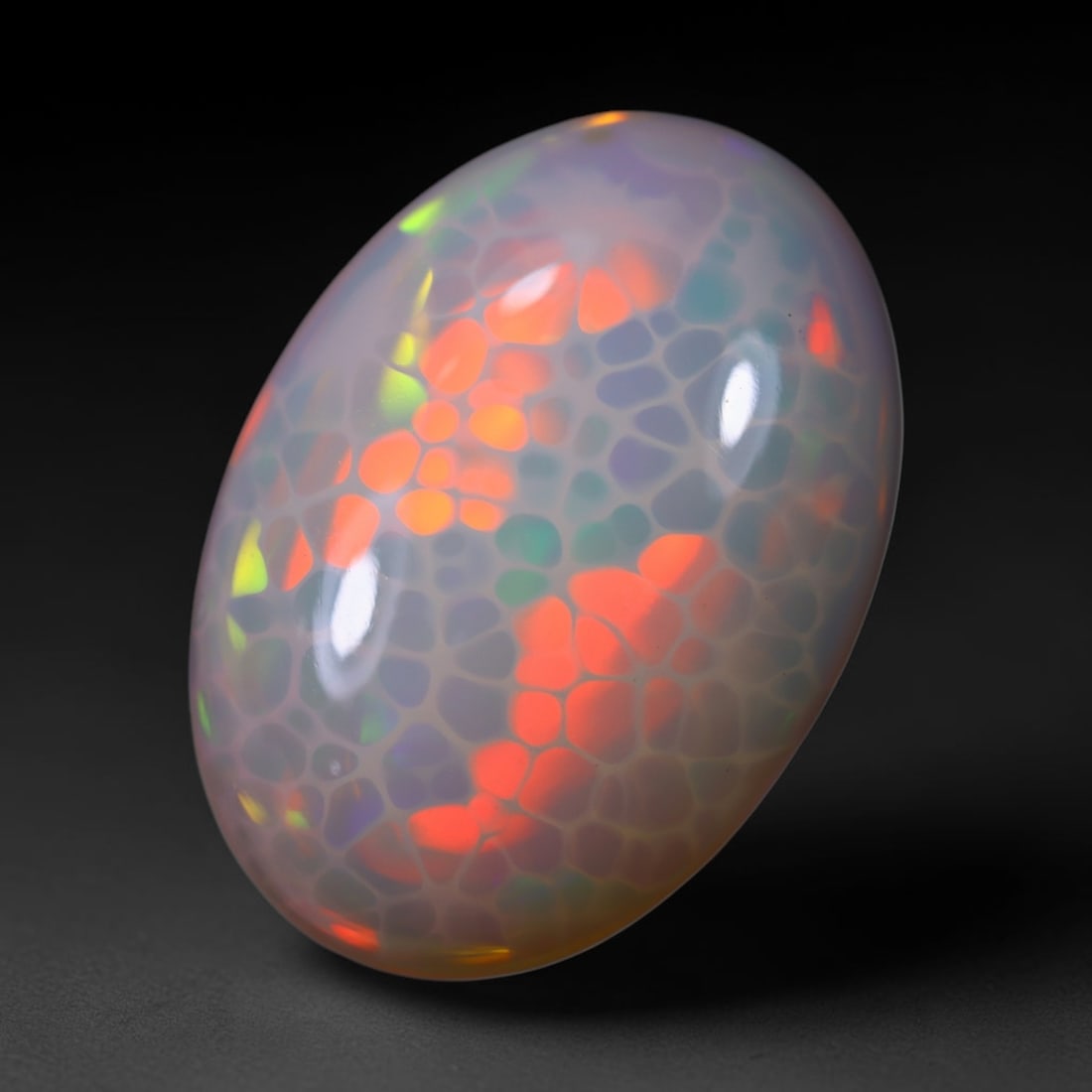 *13.96Ct Unheated Welo Opal Polished - Ethiopian Opal , 167E: Ksmith Heritage Auctioneers Subject: Natural Ethiopian Welo Opal Origin: Ethiopia Carat Weight: 13.96Ct Dimension: 21.5x15.1x8 mm Treatment: Natural Untreated Type: Caboc