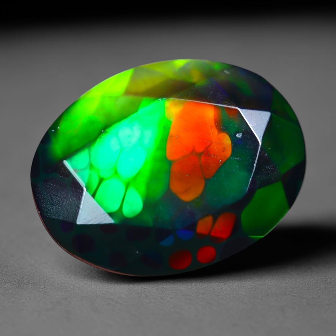 2.62Ct Natural Smoked Ethiopian Black Opal, Faceted Cut - 12.6x9.7x4.6 mm , 699C: Ksmith Heritage Auctioneers Subject: Natural Ethiopian Welo Opal Origin: Ethiopia Treatment: Smoked