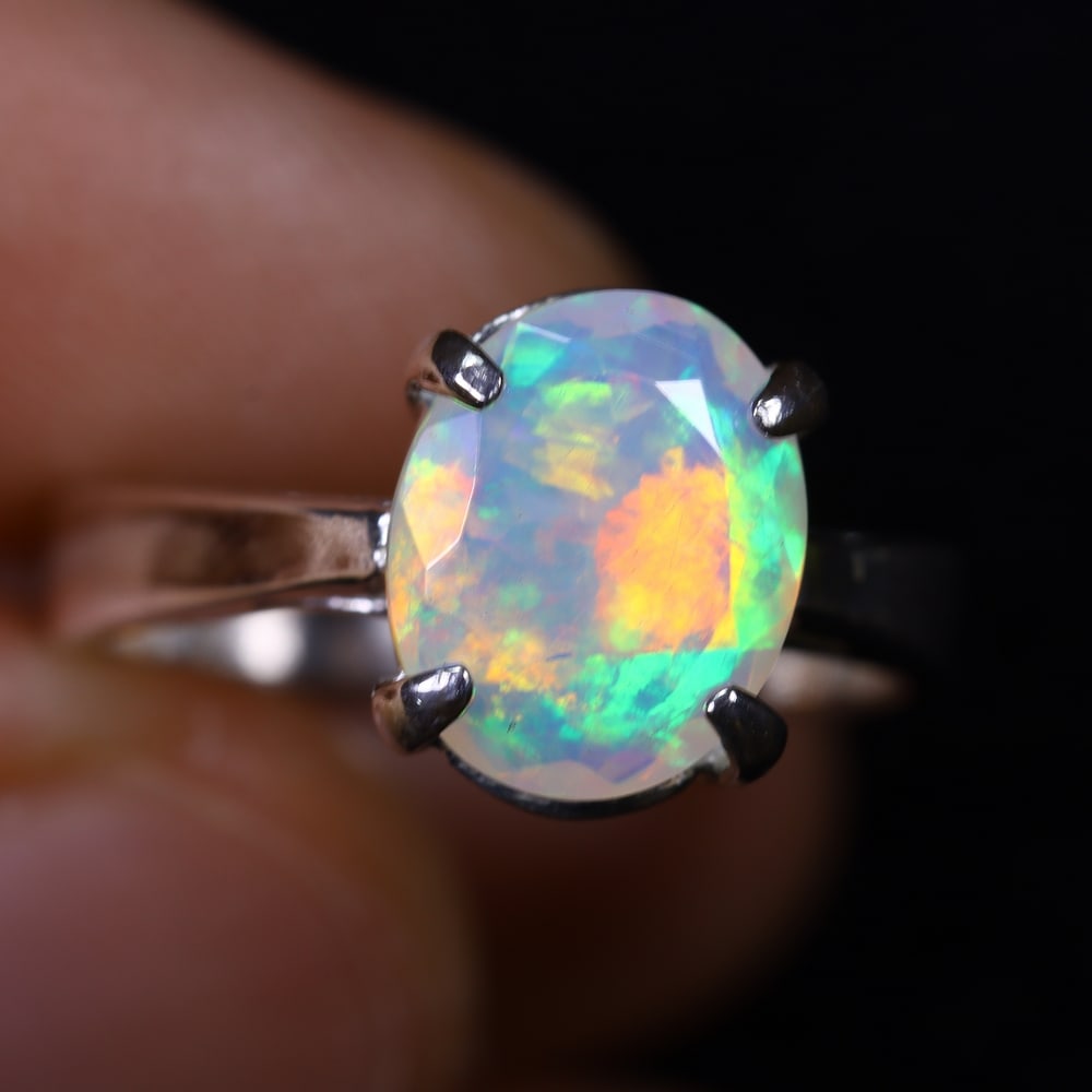 3.25g Natural Opal Stone Sterling Silver 925 Ring (Adjustable) , 1116E: Ksmith Heritage Auctioneers Subject: Natural Ethiopian Opal Ring (Silver 925) Origin: Ethiopia Stone Dimension: 11x8mm Treatment: Natural Untreated Type: Faceted, Polished