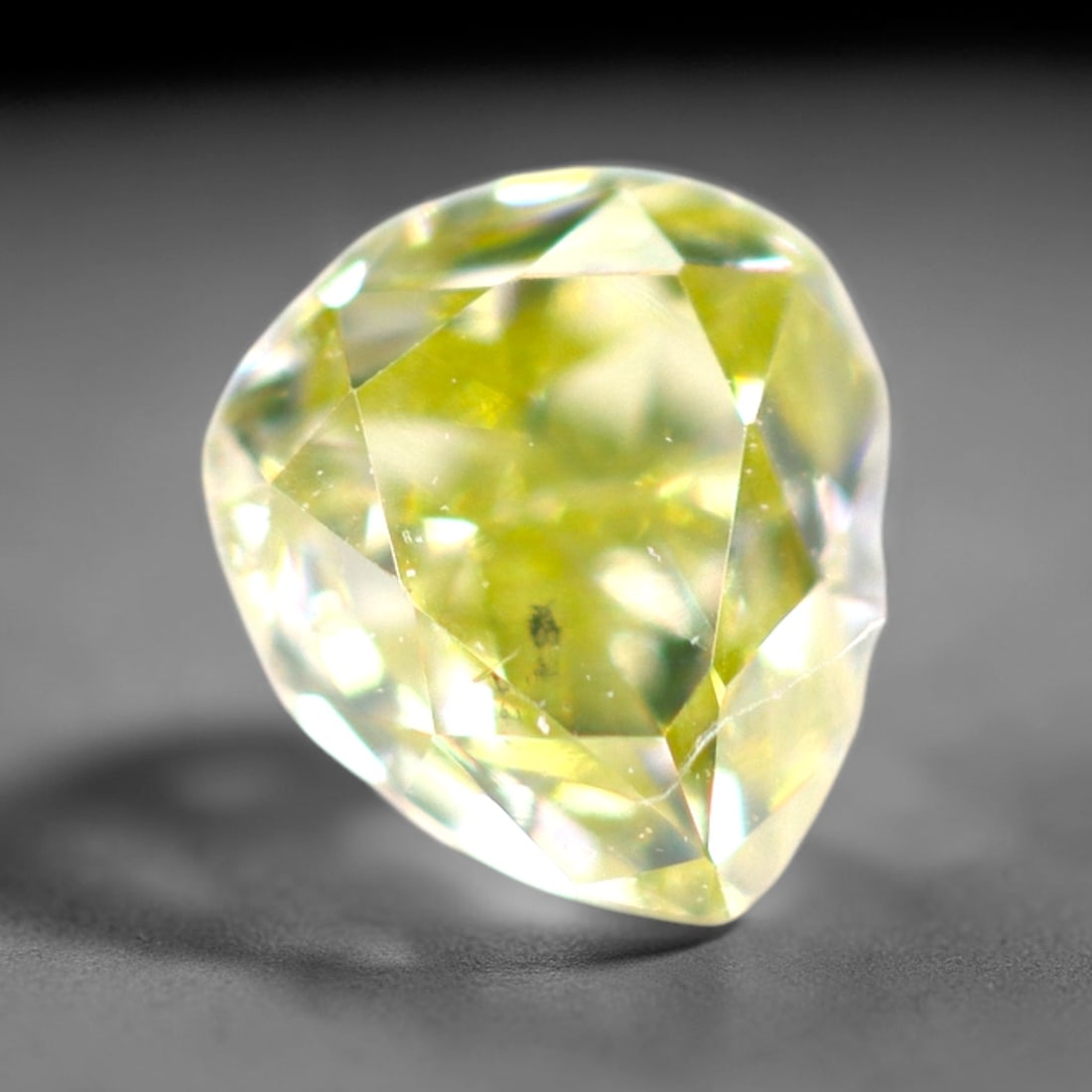 0.22Ct Fancy Diamond - Polished Faceted , 887E: Ksmith Heritage Auctioneers Subject: Natural Diamond Origin: Africa Carat Weight: 0.22Ct Dimension: 3.8x3.4x2.2 mm Treatment: Unheated Type: Faceted, Polished