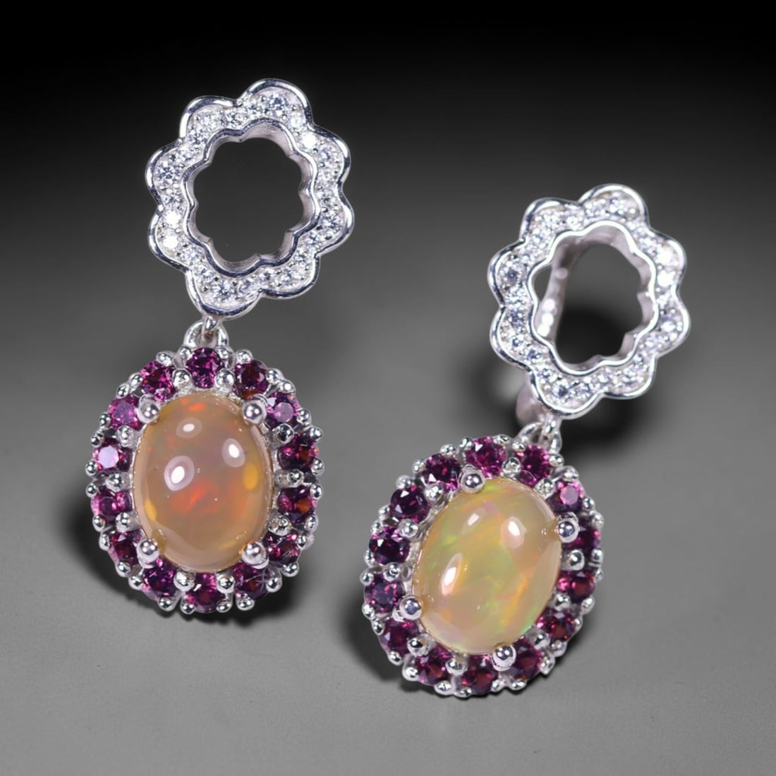 Earrings Opal, Rhodolite Garnet & Zircon - 925 Sterling Silver, 940B: Ksmith Heritage Auctioneers Subject: Natural Opal, Rhodolite Garnet & Zircon Origin: Thailand Carat Weight: 34.67ct Dimension: Gemstone 7.1x9mm Type: Earrings