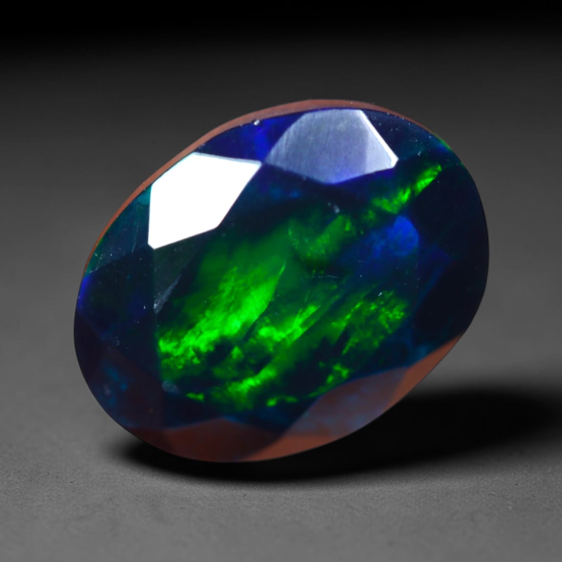 2.65Ct Natural Smoked Ethiopian Black Opal, Faceted Cut - 11.6x9.2x6.3 mm , 713C: Ksmith Heritage Auctioneers Subject: Natural Ethiopian Welo Opal Origin: Ethiopia Treatment: Smoked