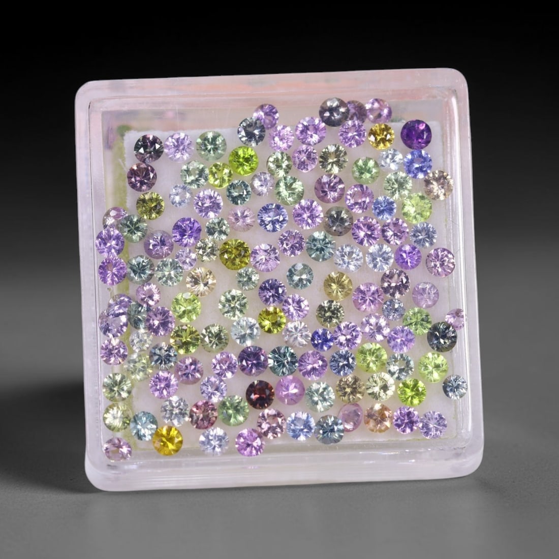 5.01Ct Fancy Sapphire Set - 2.0mm Round Diamond Cut , 16E: Ksmith Heritage Auctioneers Subject: Natural Sapphire (Without box) Origin: Burma Dimension: 2x2x1.6 mm Treatment: Heated Shape: Round Type: Faceted, Polished