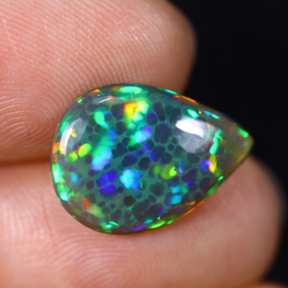 2.83Ct Natural Ethiopian Black Opal - 15.5x11.3x3.5 mm , 612C: Ksmith Heritage Auctioneers Subject: Natural Ethiopian Welo Opal Origin: Ethiopia Treatment: Smoked