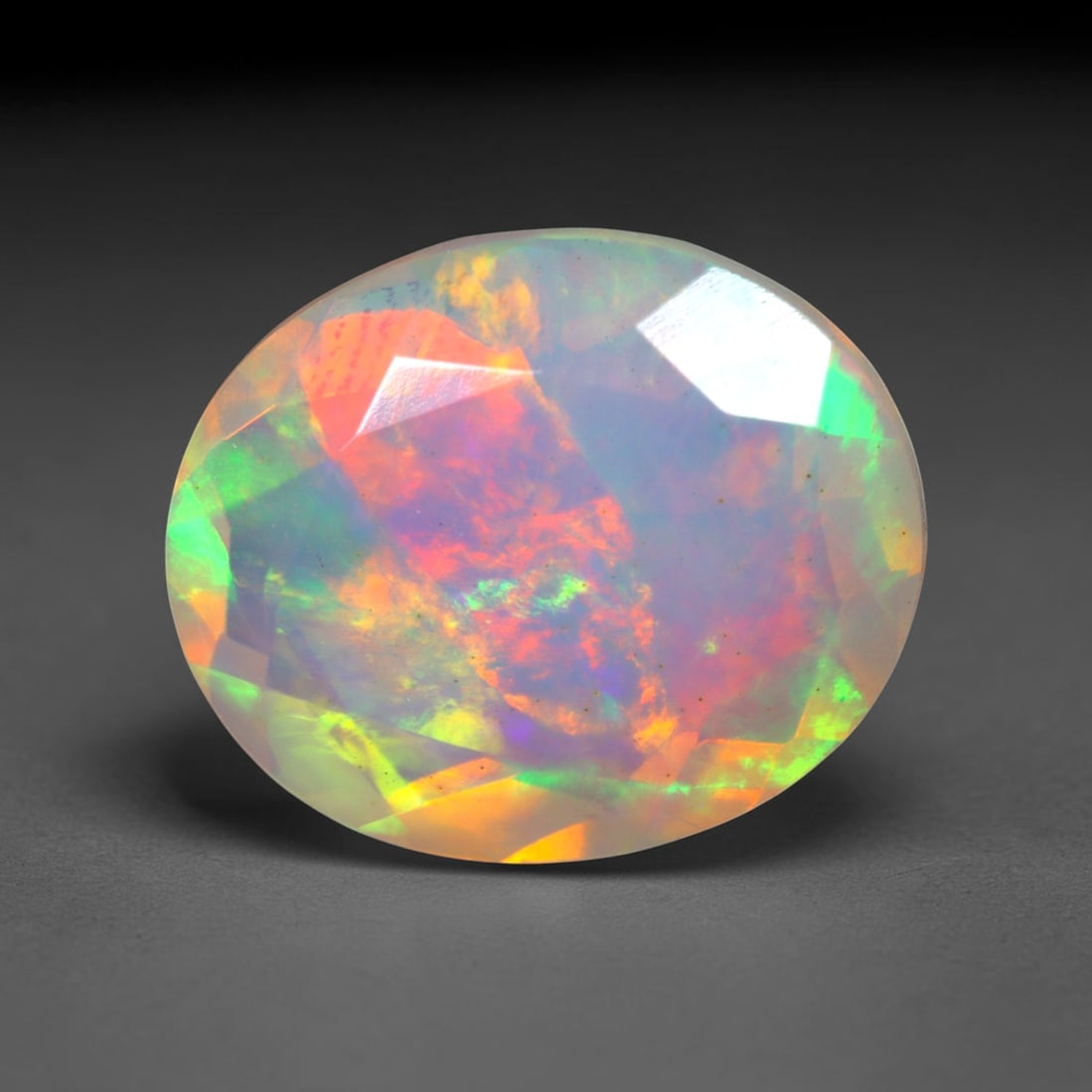 2.86Ct Natural Ethiopian Opal, Faceted Cut - 11.9x10.0x5.2 mm , 681C: Ksmith Heritage Auctioneers Subject: Natural Ethiopian Welo Opal Origin: Ethiopia Treatment: Unheated