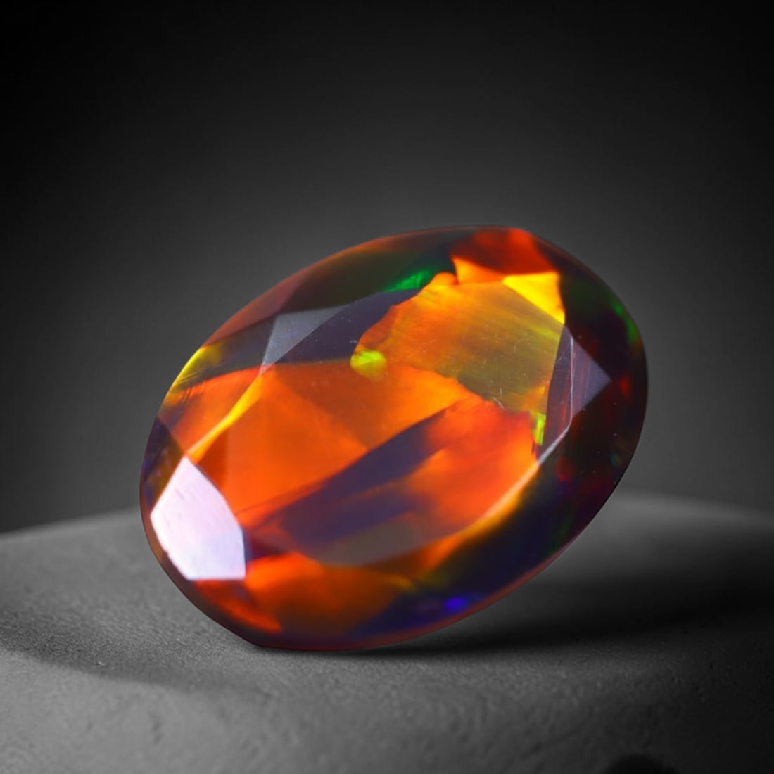 *1.70Ct Welo Black Opal Polished - Ethiopian Opal , 297E: Ksmith Heritage Auctioneers Subject: Natural Ethiopian Welo Black Opal Origin: Ethiopia Carat Weight: 1.70Ct Dimension: 10.3x7.5x5.1 mm Treatment: Smoked Type: Faceted, Po