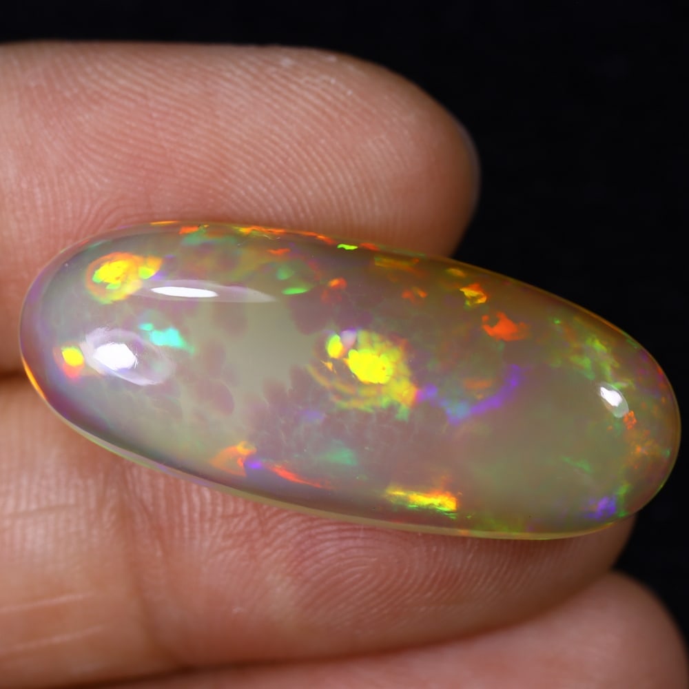 12.74Ct Natural Ethiopian Opal - 30.6x12.8x5.8 mm , 550C: Ksmith Heritage Auctioneers Subject: Natural Ethiopian Welo Opal Origin: Ethiopia Treatment: Unheated