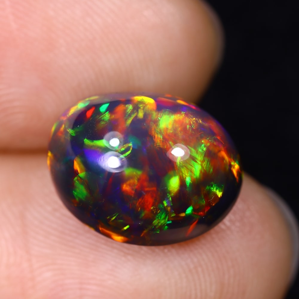 6.28Ct Natural Ethiopian Black Opal - 13.4x10.8x8.5 mm , 589C: Ksmith Heritage Auctioneers Subject: Natural Ethiopian Welo Opal Origin: Ethiopia Treatment: Smoked