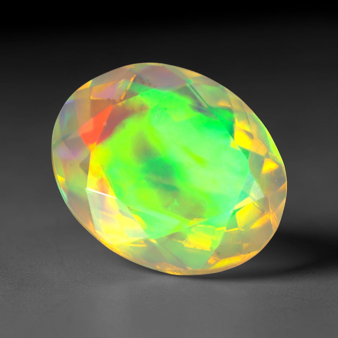 2.72Ct Natural Ethiopian Opal, Faceted Cut - 12.1x9.9x5.7 mm , 661C: Ksmith Heritage Auctioneers Subject: Natural Ethiopian Welo Opal Origin: Ethiopia Treatment: Unheated
