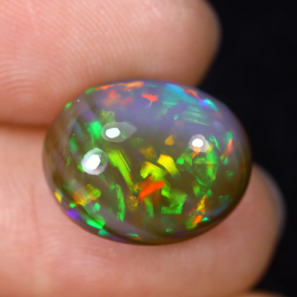 8.35Ct Natural Ethiopian Opal - 15.3x12.4x8.1 mm , 560C: Ksmith Heritage Auctioneers Subject: Natural Ethiopian Welo Opal Origin: Ethiopia Treatment: Unheated