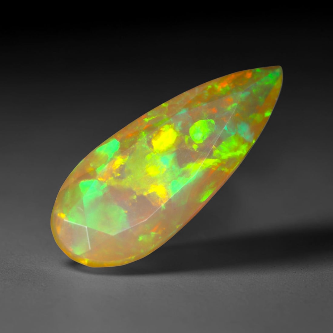 2.02Ct Natural Ethiopian Opal, Faceted Cut - 16.3x6.4x5.4 mm , 644C: Ksmith Heritage Auctioneers Subject: Natural Ethiopian Welo Opal Origin: Ethiopia Treatment: Unheated