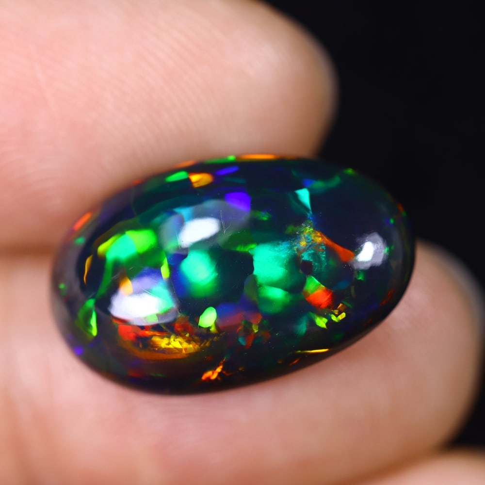 8.50Ct Natural Ethiopian Black Opal - 18.7x11.5x7.8 mm , 595C: Ksmith Heritage Auctioneers Subject: Natural Ethiopian Welo Opal Origin: Ethiopia Treatment: Smoked