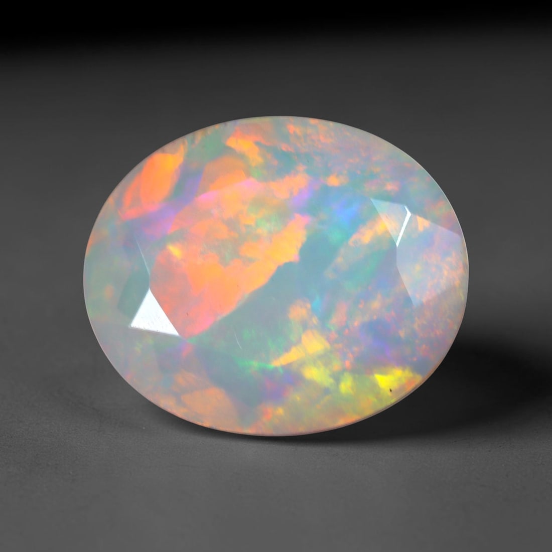 2.49Ct Natural Ethiopian Opal, Faceted Cut - 12.0x10.0x4.5 mm , 687C: Ksmith Heritage Auctioneers Subject: Natural Ethiopian Welo Opal Origin: Ethiopia Treatment: Unheated