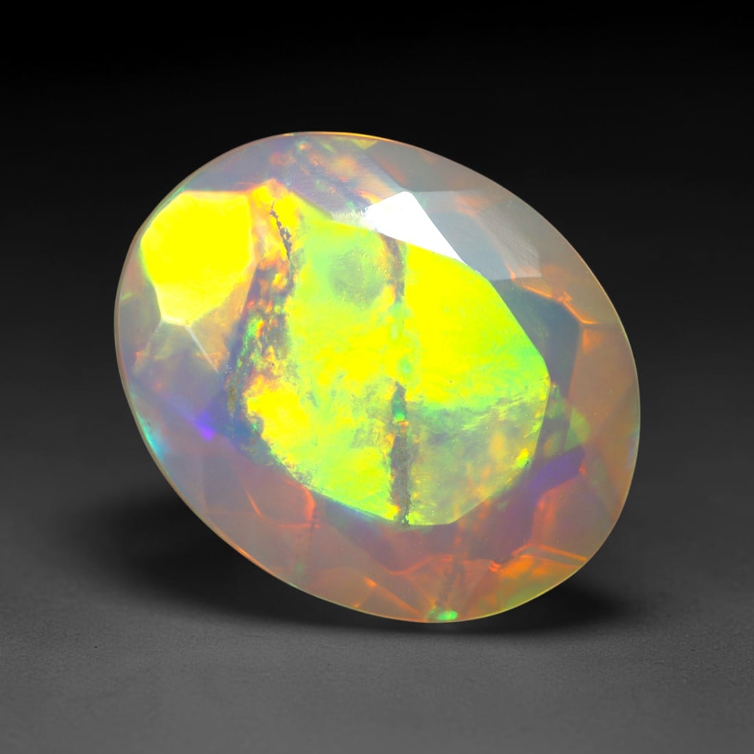 1.94Ct Natural Ethiopian Opal, Faceted Cut - 11.0x8.8x5.0 mm , 671C: Ksmith Heritage Auctioneers Subject: Natural Ethiopian Welo Opal Origin: Ethiopia Treatment: Unheated