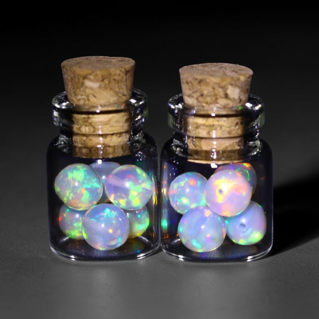 Twin Pack - 4.5mm Ethiopian Opal Ball in Display Jar - Bottle Size 1.5cm , 90C: Ksmith Heritage AuctioneersSubject: Natural Opal (with bottle) Origin: Ethiopia Treatment: Unheated