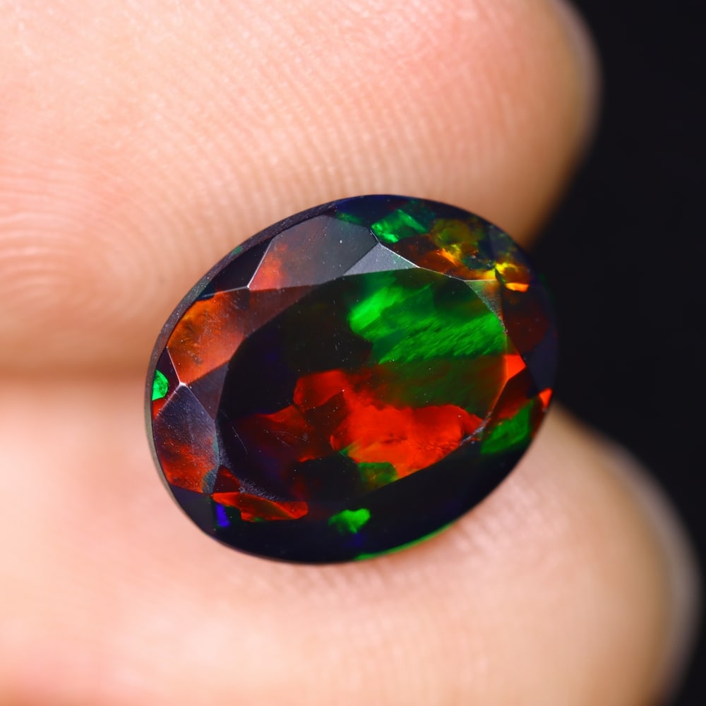 2.40Ct Ethiopian Black Smoked Opal, Faceted Cut - 11.2x9.2x5.4 mm , 626C: Ksmith Heritage Auctioneers Subject: Natural Ethiopian Welo Opal Origin: Ethiopia Treatment: Smoked