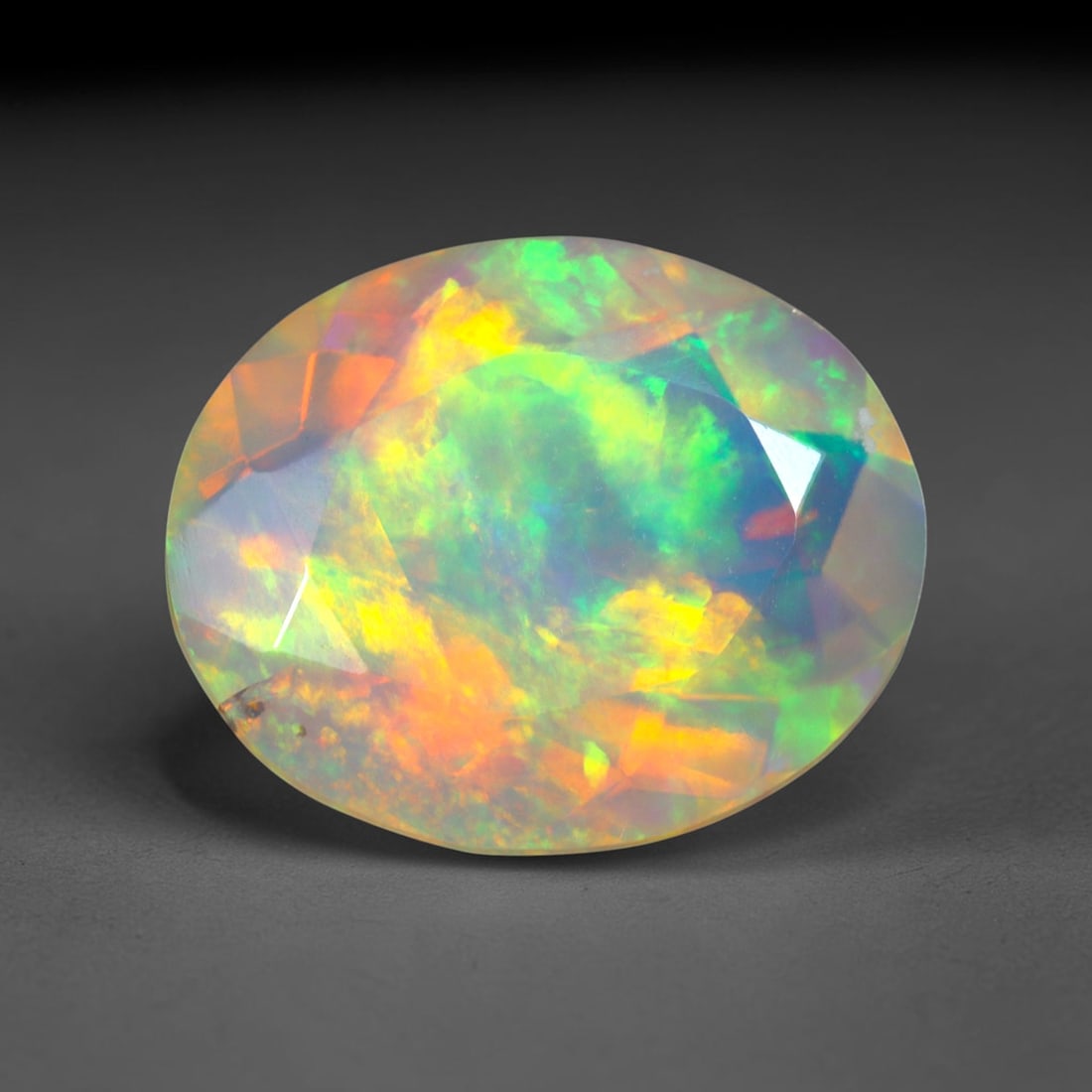 2.18Ct Natural Ethiopian Opal, Faceted Cut - 11.1x9.1x5.5 mm , 638C: Ksmith Heritage Auctioneers Subject: Natural Ethiopian Welo Opal Origin: Ethiopia Treatment: Unheated