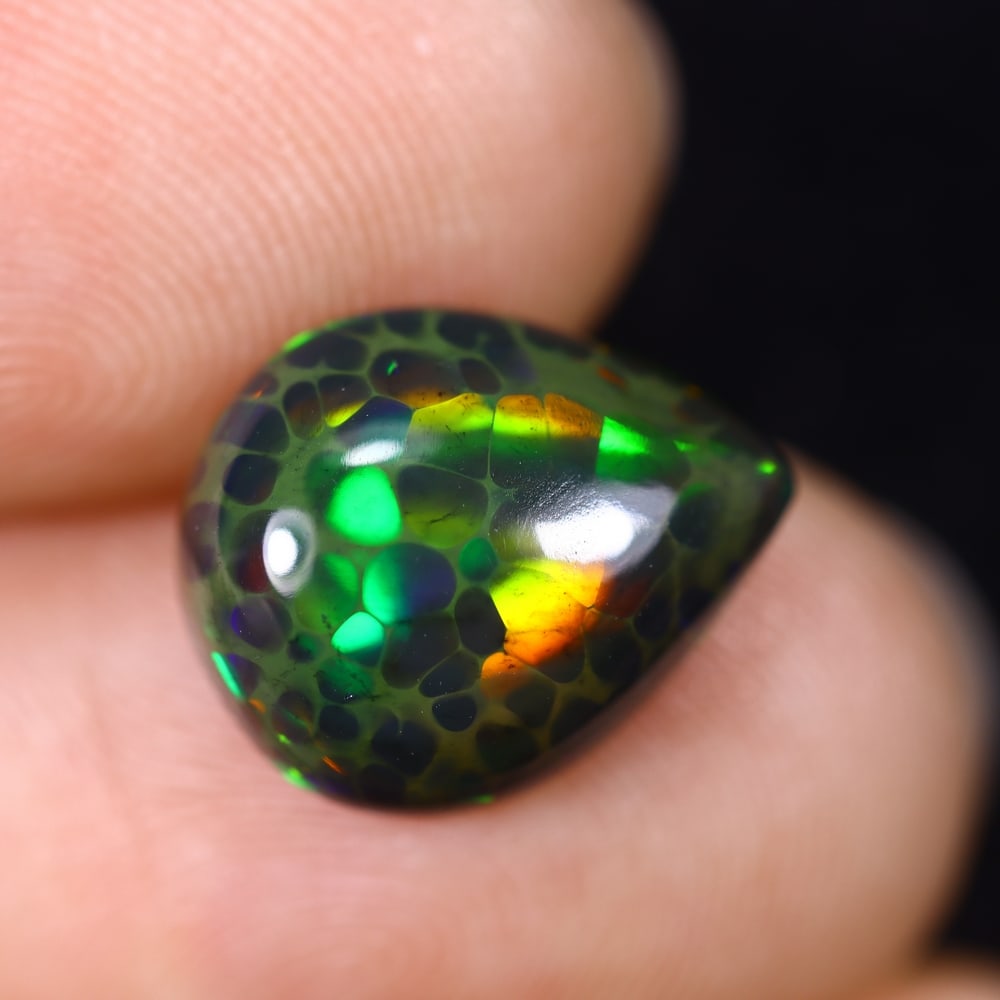 3.00Ct Natural Ethiopian Black Opal - 12.7x10.4x4.9 mm , 617C: Ksmith Heritage Auctioneers Subject: Natural Ethiopian Welo Opal Origin: Ethiopia Treatment: Smoked