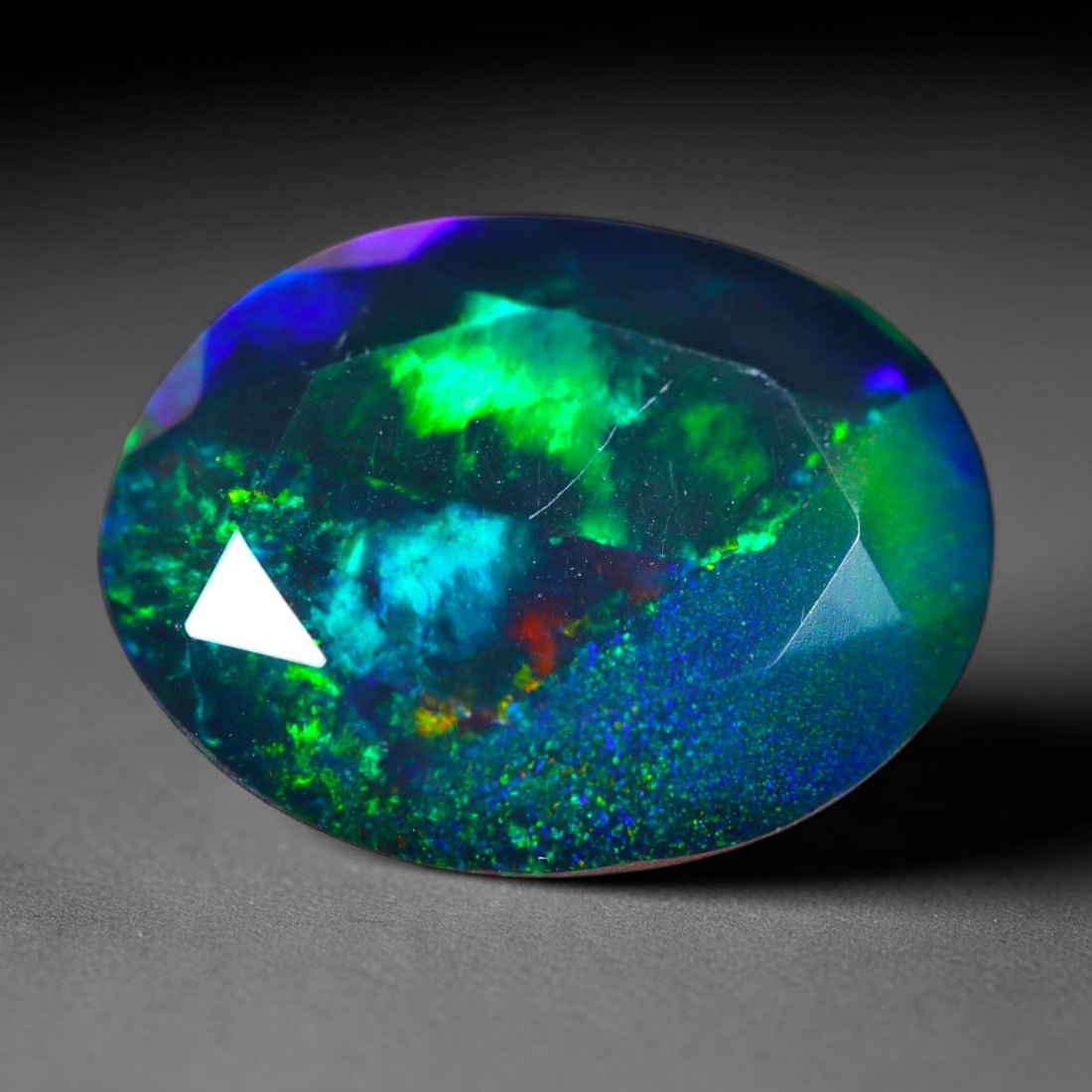 2.90Ct Natural Smoked Ethiopian Black Opal, Faceted Cut - 12.5x9.5x5.5 mm , 726C: Ksmith Heritage Auctioneers Subject: Natural Ethiopian Welo Opal Origin: Ethiopia Treatment: Smoked