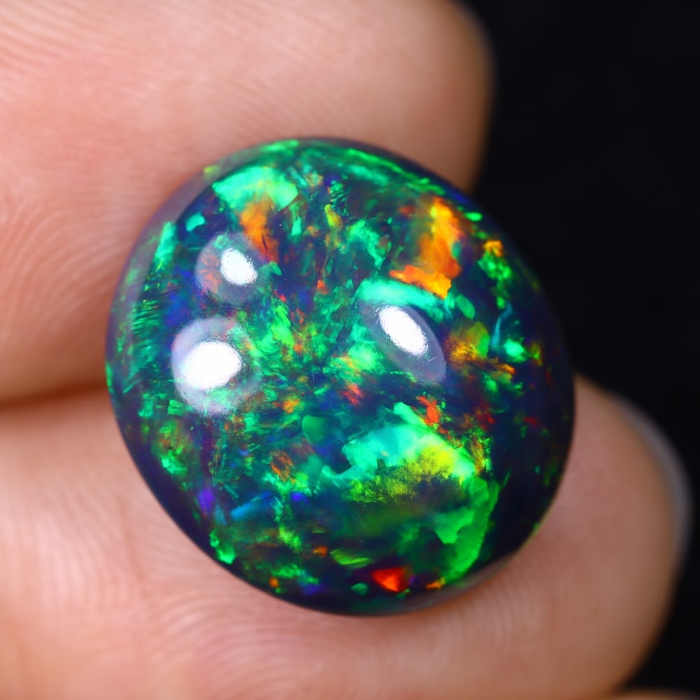 6.85Ct Natural Ethiopian Black Opal - 16.5x14.6x6.5 mm , 583C: Ksmith Heritage Auctioneers Subject: Natural Ethiopian Welo Opal Origin: Ethiopia Treatment: Smoked