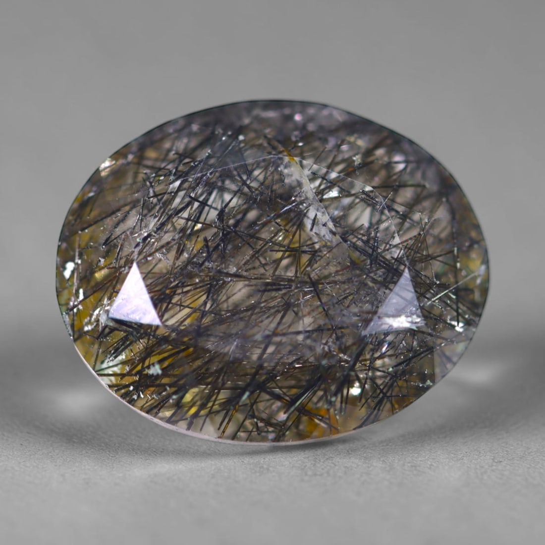 10.29ct Black Rutiled Quartz - Polished Faceted , 990E: Ksmith Heritage Auctioneers Subject: Natural Black Rutiled Quartz Carat Weight: 10.29ct Dimension: 16.7 x 13.5 x 7.2mm