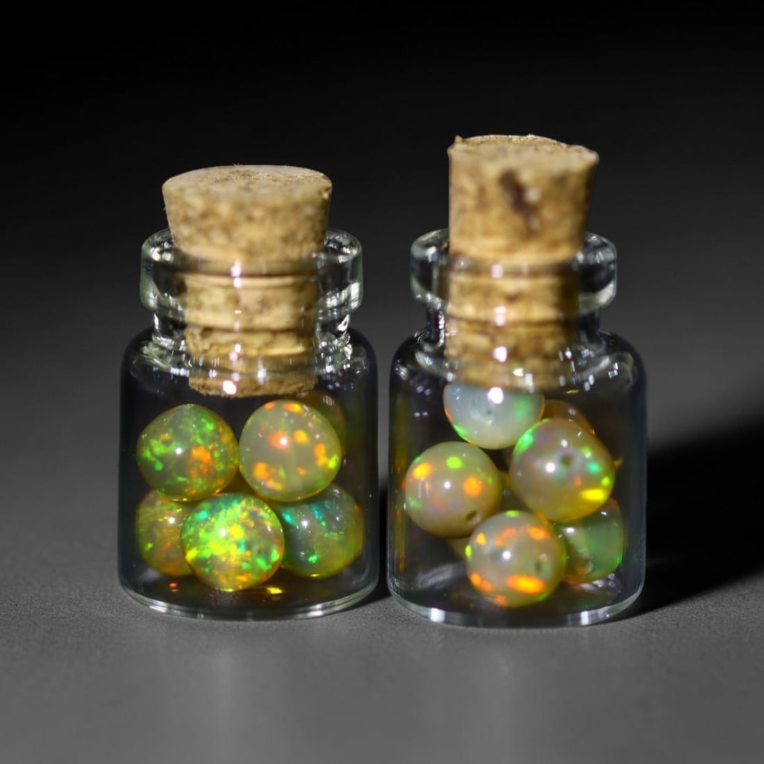 Twin Pack - 4.5mm Ethiopian Opal Ball in Display Jar - Bottle Size 1.5cm , 73C: Ksmith Heritage AuctioneersSubject: Natural Opal (with bottle) Origin: Ethiopia Treatment: Unheated