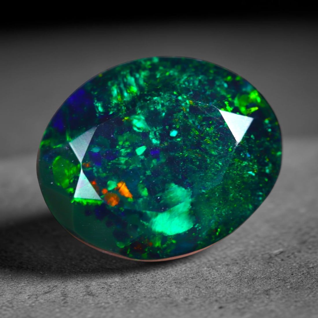 2.20Ct Natural Smoked Ethiopian Black Opal, Faceted Cut - 10.8x9.0x6.2 mm , 728C: Ksmith Heritage Auctioneers Subject: Natural Ethiopian Welo Opal Origin: Ethiopia Treatment: Smoked