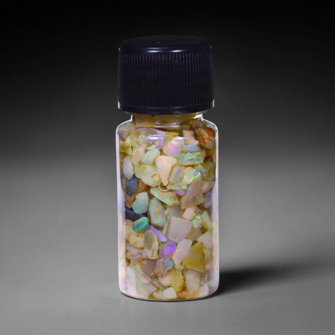 Australian Lightning Ridge Crystal Black Opal Rough Chip Jar (Good For Display), 930B: Ksmith Heritage Auctioneers Subject: Natural Australian Opal Origin: Australia Quantity: 1 Jar as photo