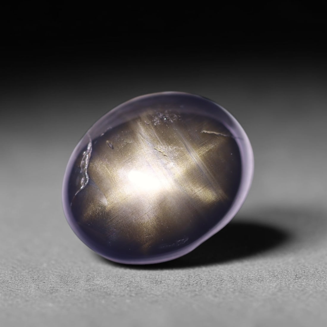 5.03cts 6 Rays Black Star Sapphire , 695E: Ksmith Heritage Auctioneers Subject: Natural 6 Rays Star Sapphire Origin: Myanmar Carat Weight: 5.03cts Dimension: 10.2x8.3x4.9 mm Treatment: Diffusion Type: Cabochon, Pol