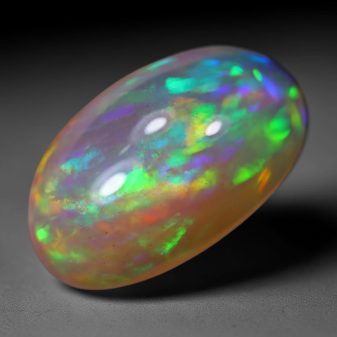 *5.14Ct Welo Opal Polished - Ethiopian Opal, 1159B: Ksmith Heritage Auctioneers Subject: Natural Ethiopian Welo Opal Origin: Ethiopia Carat Weight: 5.14Ct Dimension: 15.2x9.3x6.8 mm Treatment: Natural Untreated Type: Cabochon, P