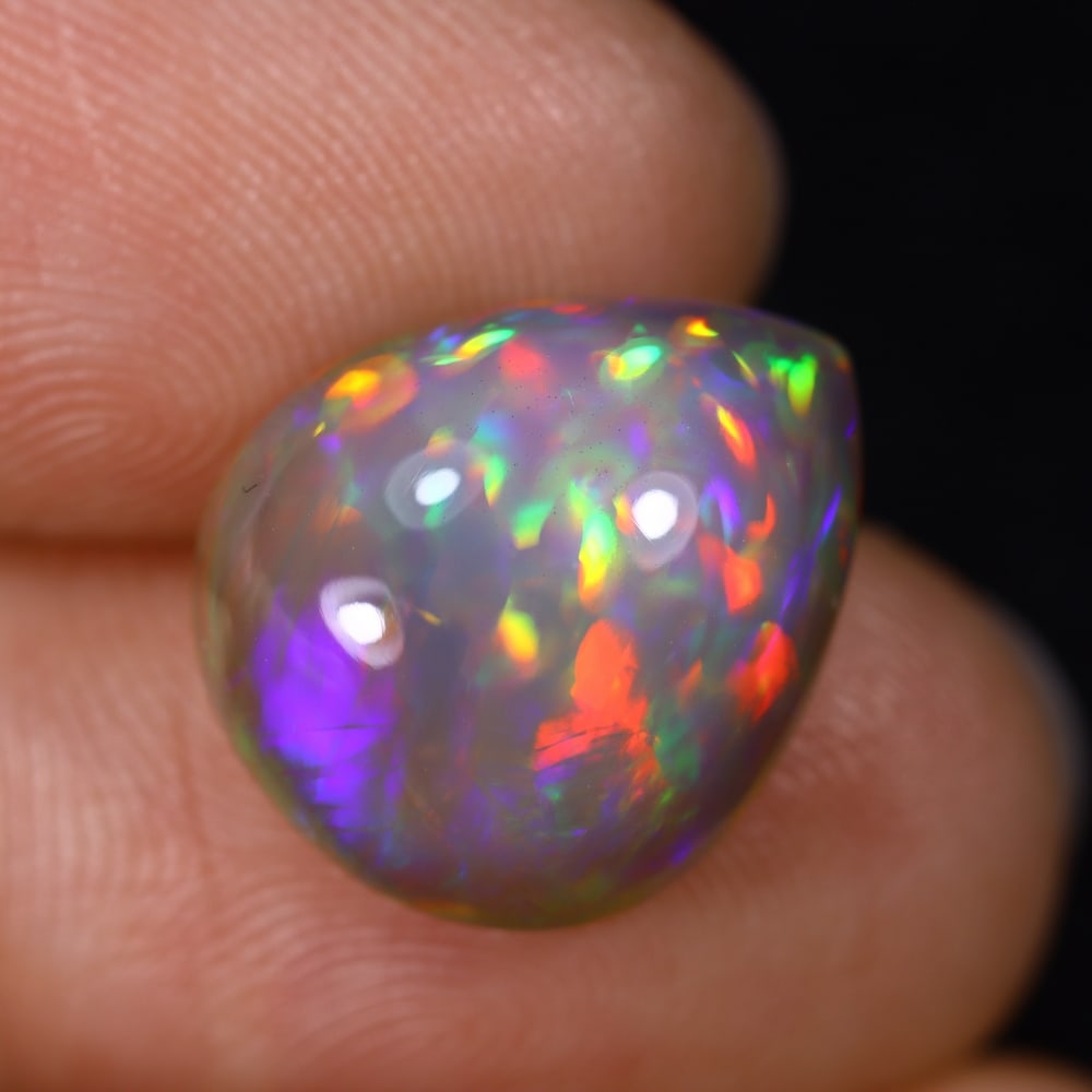 6.30Ct Natural Ethiopian Opal - 14.7x12.4x7.1 mm , 553C: Ksmith Heritage Auctioneers Subject: Natural Ethiopian Welo Opal Origin: Ethiopia Treatment: Unheated