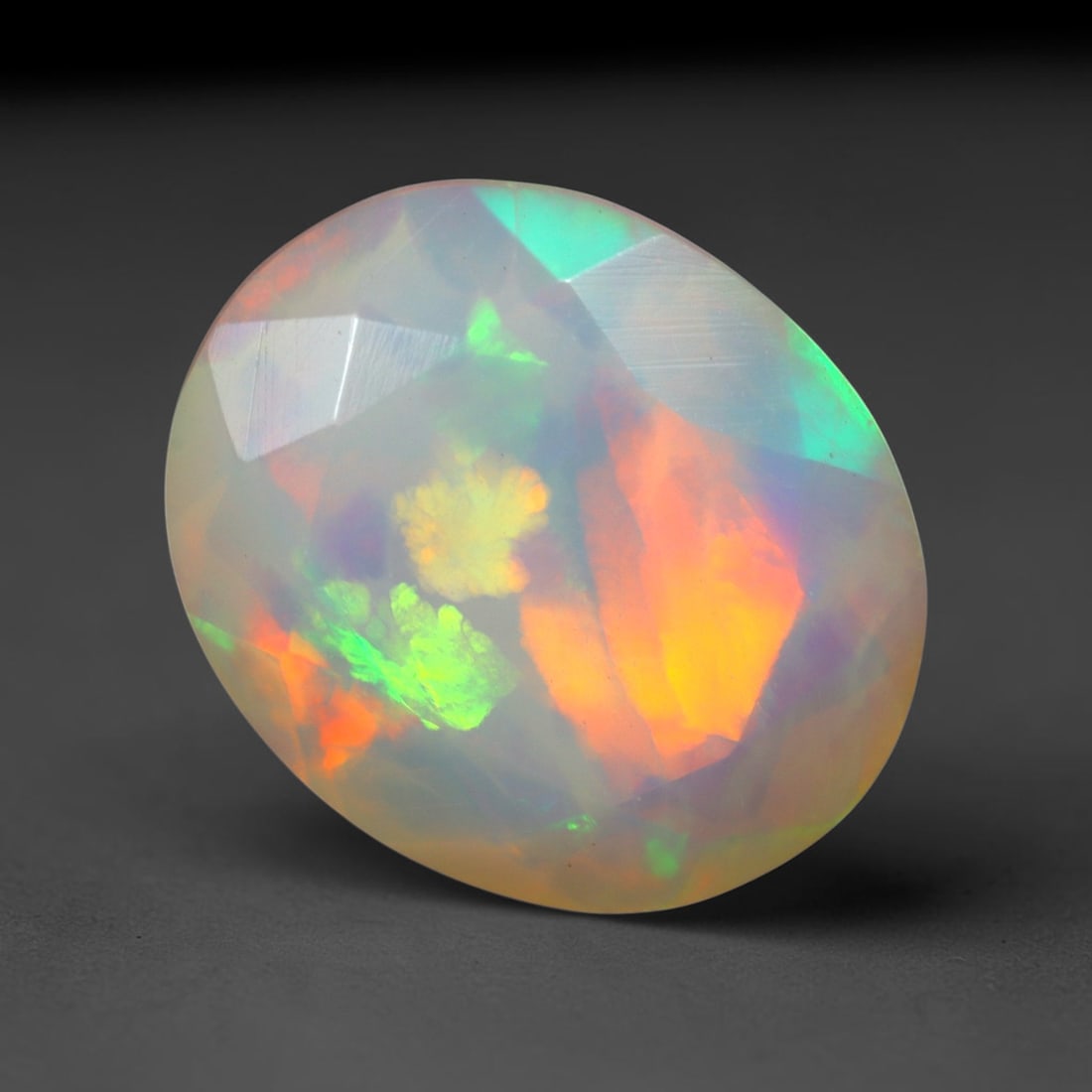2.73Ct Natural Ethiopian Opal, Faceted Cut - 12.1x10.0x5.7 mm , 634C: Ksmith Heritage Auctioneers Subject: Natural Ethiopian Welo Opal Origin: Ethiopia Treatment: Unheated