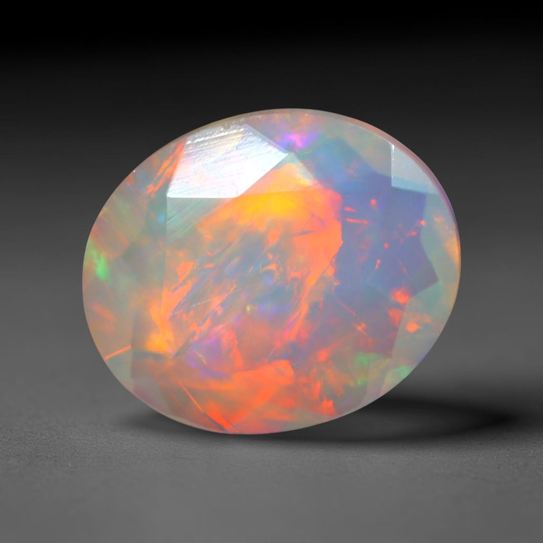 2.67Ct Natural Ethiopian Opal, Faceted Cut - 12.1x10.0x5.0 mm , 631C: Ksmith Heritage Auctioneers Subject: Natural Ethiopian Welo Opal Origin: Ethiopia Treatment: Unheated