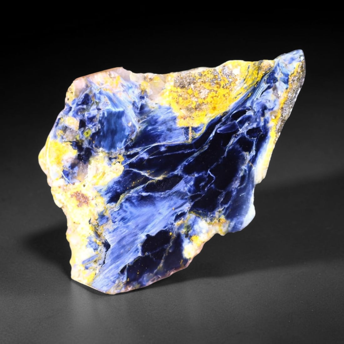 72.94Ct Pietersite Slab - Gemstone Crystal - Freeform Slice, 771B: Ksmith Heritage Auctioneers Subject: Natural Pietersite Origin: Namibia, South Africa Carat Weight: 72.94Ct Dimension: 66.1 x 44.6 x 3.8 mm Treatment: Natural Untreated Shape: