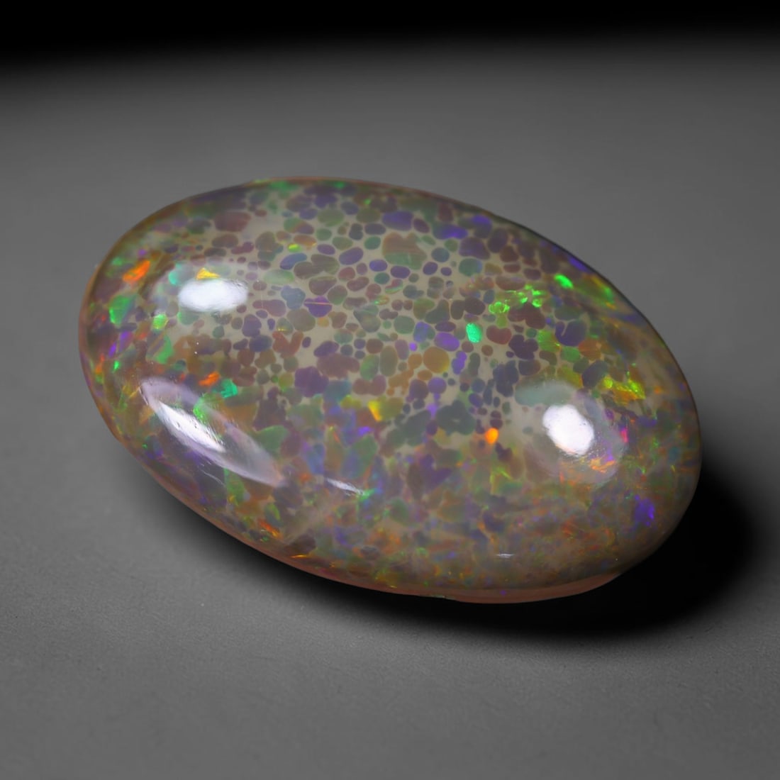 *15.64Ct Welo Opal Polished - Ethiopian Opal, 538B: Ksmith Heritage Auctioneers Subject: Natural Ethiopian Welo Opal Origin: Ethiopia Carat Weight: 15.64Ct Dimension: 27.6x17.8x6.6 mm Treatment: Natural Untreated Type: Cabochon,