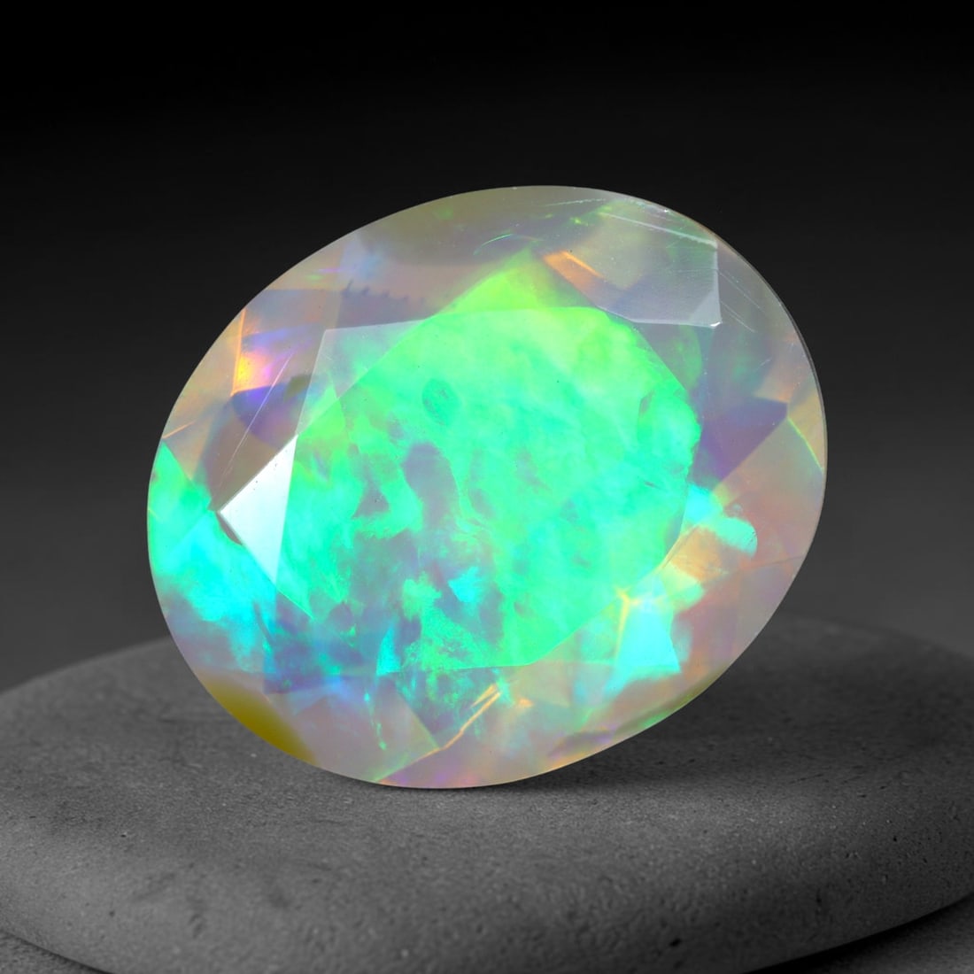 2.52Ct Natural Ethiopian Opal, Faceted Cut - 12.0x10.0x5.5 mm , 674C: Ksmith Heritage Auctioneers Subject: Natural Ethiopian Welo Opal Origin: Ethiopia Treatment: Unheated