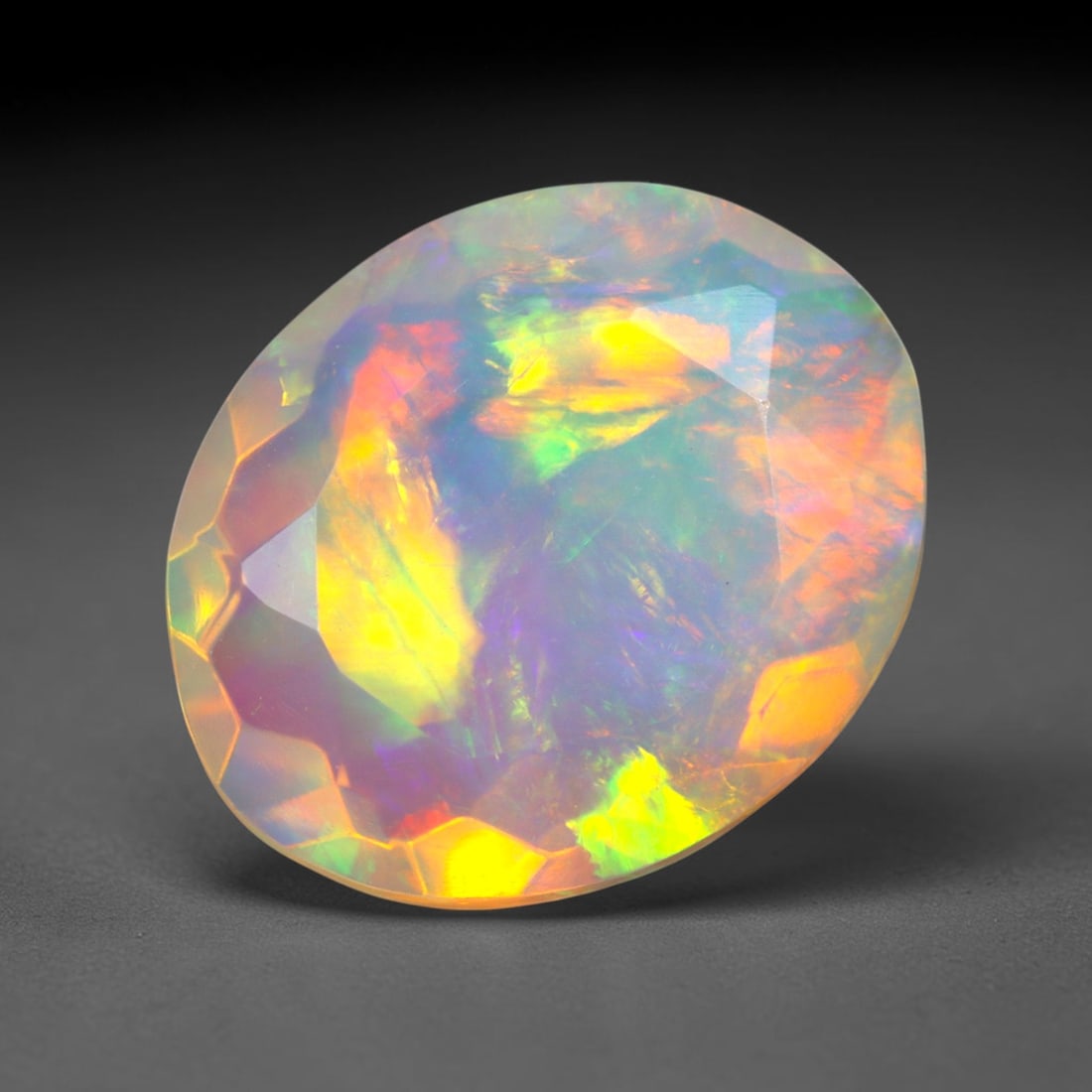 1.77Ct Natural Ethiopian Opal, Faceted Cut - 11.0x9.0x5.1 mm , 680C: Ksmith Heritage Auctioneers Subject: Natural Ethiopian Welo Opal Origin: Ethiopia Treatment: Unheated