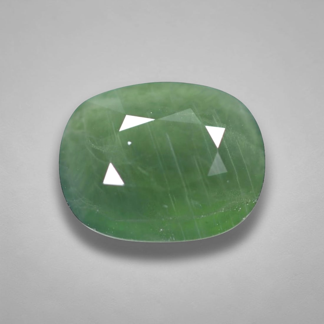 *4.36Ct Heated Green Sapphire - Polished Faceted , 317C: Ksmith Heritage Auctioneers Subject: Natural Sapphire Carat Weight: 4.36Ct Dimension: 10.5x8.3x5.1 mm Treatment: Heated Type: Faceted, Polished