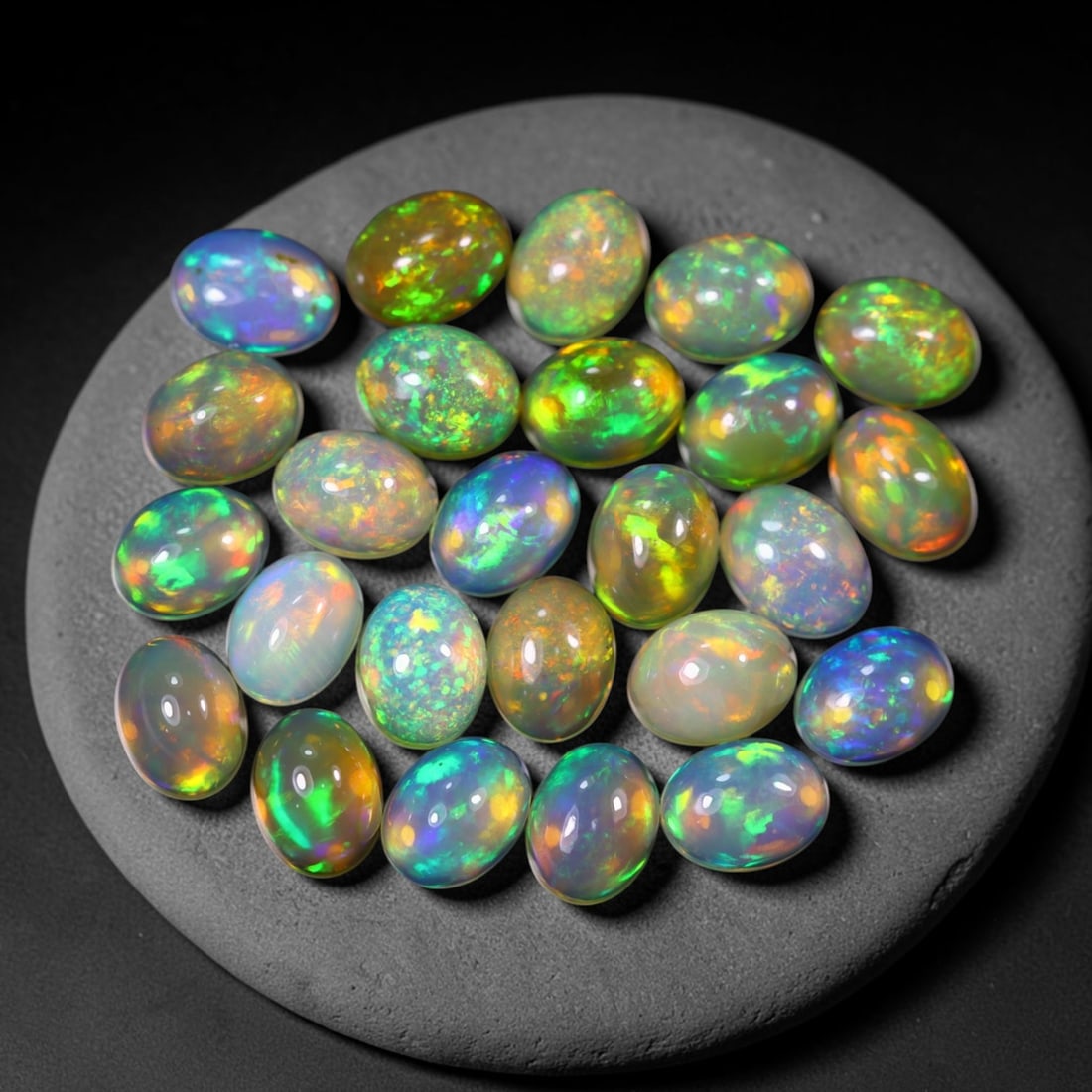 *22.71Ct 8x6mm Welo Opal Lot - Ethiopian Opal, 366C: Ksmith Heritage Auctioneers Subject: Natural Ethiopian Welo Opal Origin: Ethiopia Carat Weight: 22.71Ct Dimension: 8x6x4.4 mm Treatment: Natural Untreated Type: Cabochon, Polis