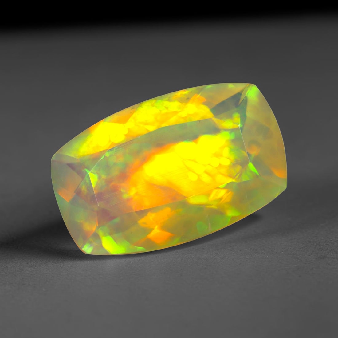 2.95Ct Natural Ethiopian Opal, Faceted Cut - 13.4x8.5x5.7 mm , 641C: Ksmith Heritage Auctioneers Subject: Natural Ethiopian Welo Opal Origin: Ethiopia Treatment: Unheated