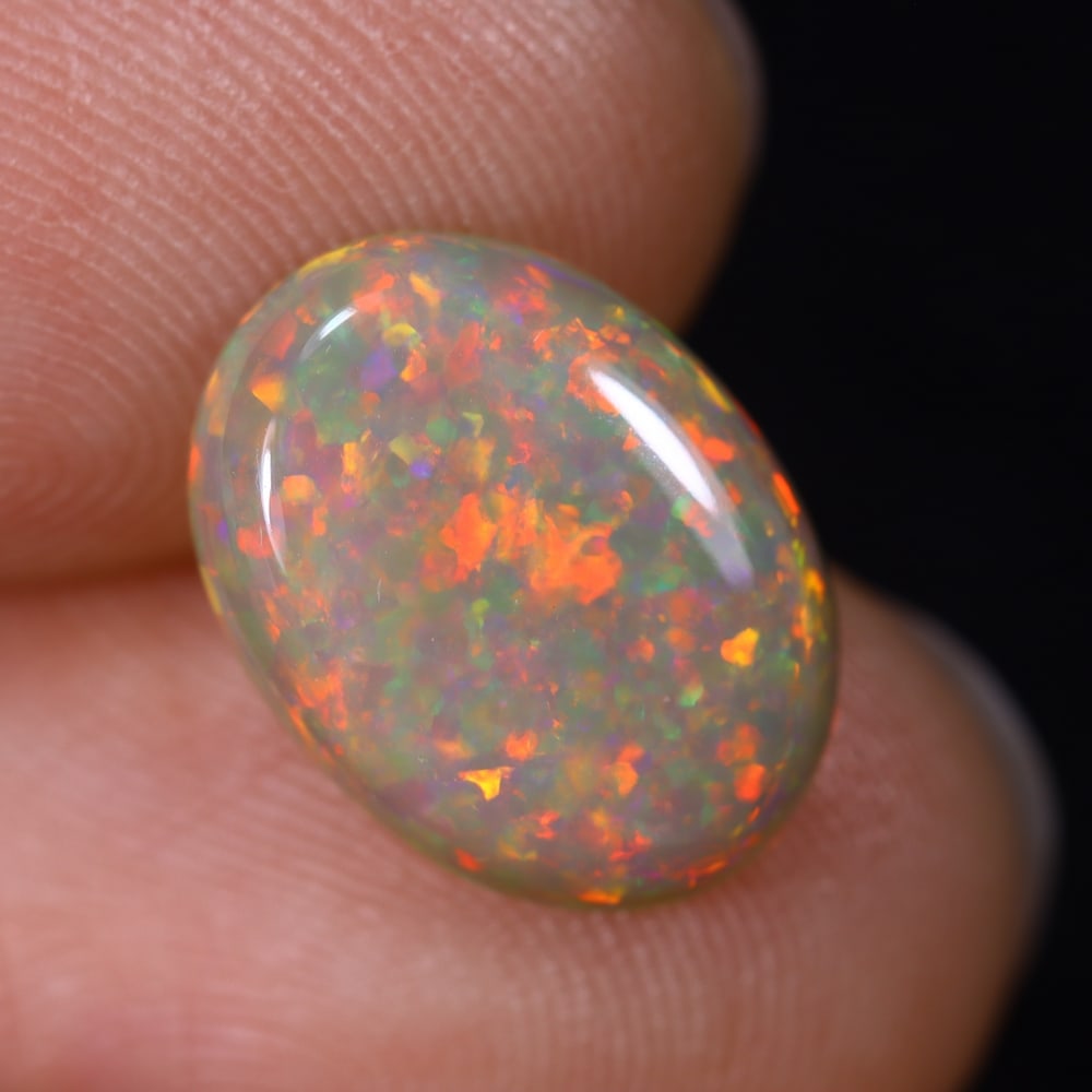 2.54Ct Natural Ethiopian Opal - 13.1x9.6x3.4 mm , 562C: Ksmith Heritage Auctioneers Subject: Natural Ethiopian Welo Opal Origin: Ethiopia Treatment: Unheated