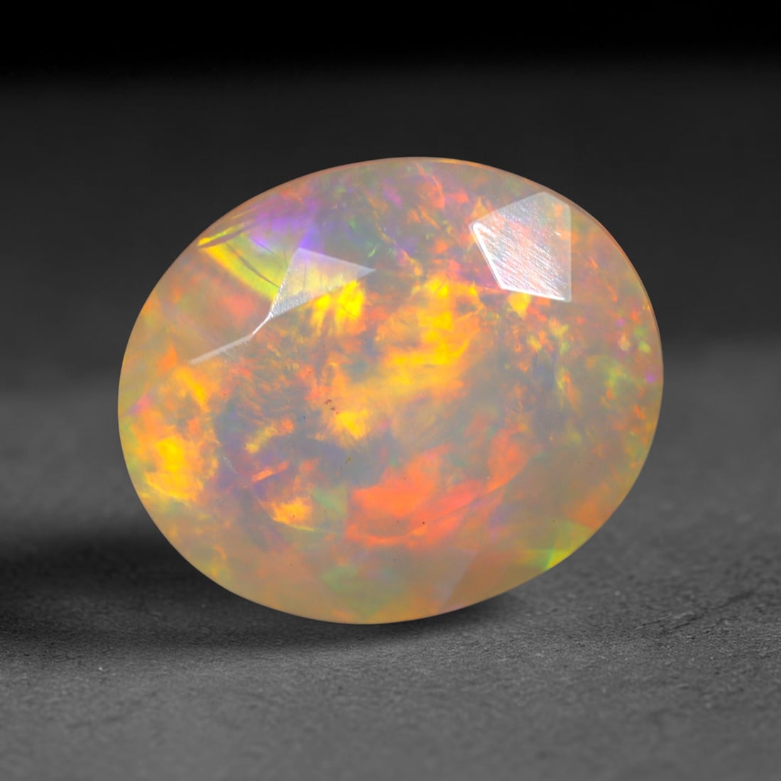 3.75Ct Natural Ethiopian Opal, Faceted Cut - 12.1x10.1x6.7 mm , 666C: Ksmith Heritage Auctioneers Subject: Natural Ethiopian Welo Opal Origin: Ethiopia Treatment: Unheated