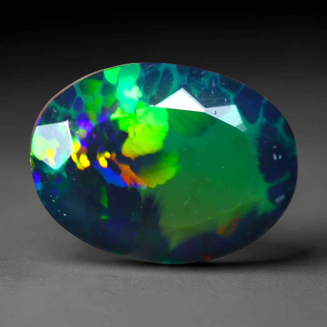 1.90Ct Natural Smoked Ethiopian Black Opal, Faceted Cut - 11.4x8.4x5.2 mm , 716C: Ksmith Heritage Auctioneers Subject: Natural Ethiopian Welo Opal Origin: Ethiopia Treatment: Smoked