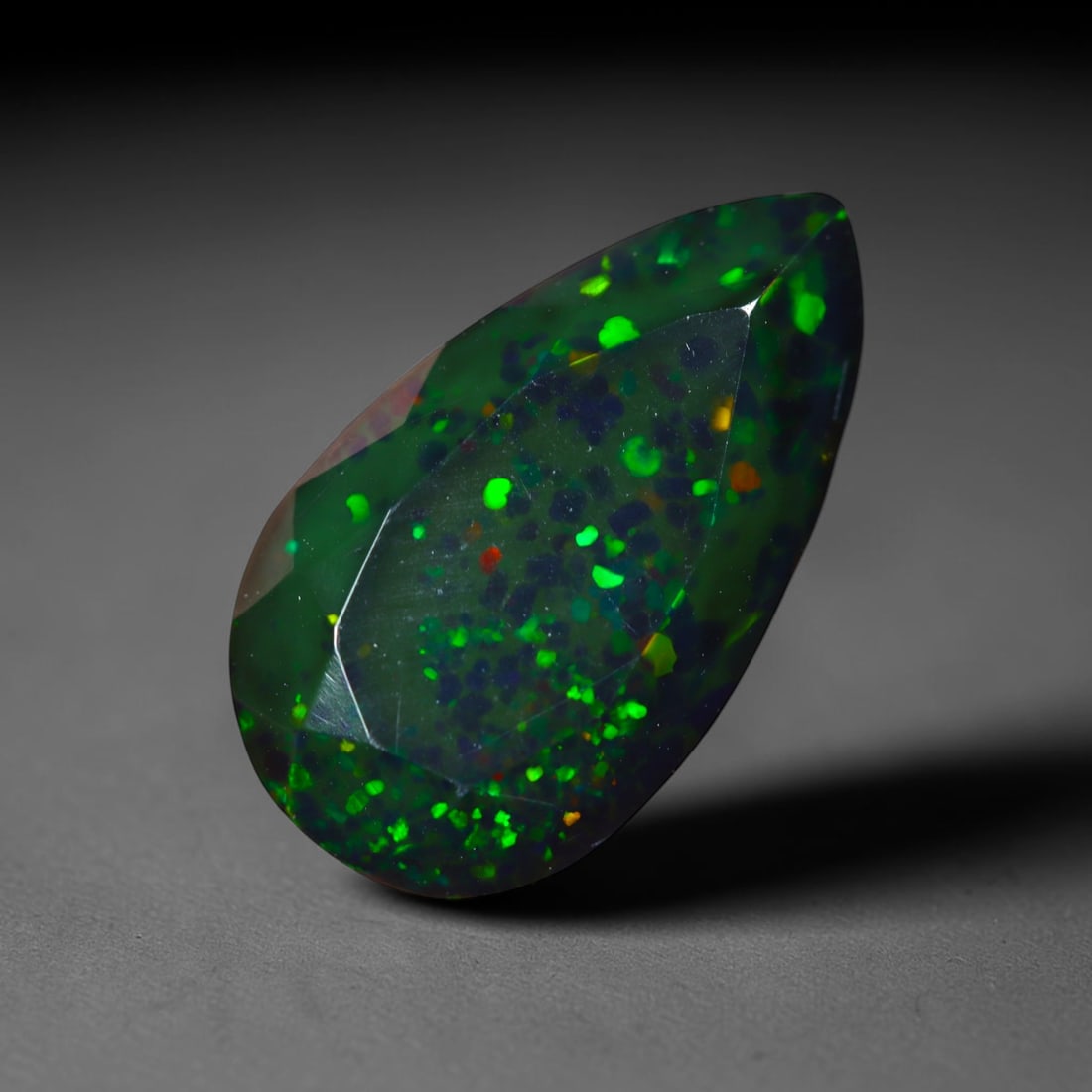 2.71Ct Natural Smoked Ethiopian Black Opal, Faceted Cut - 11.4x8.4x5.8 mm , 700C: Ksmith Heritage Auctioneers Subject: Natural Ethiopian Welo Opal Origin: Ethiopia Treatment: Smoked