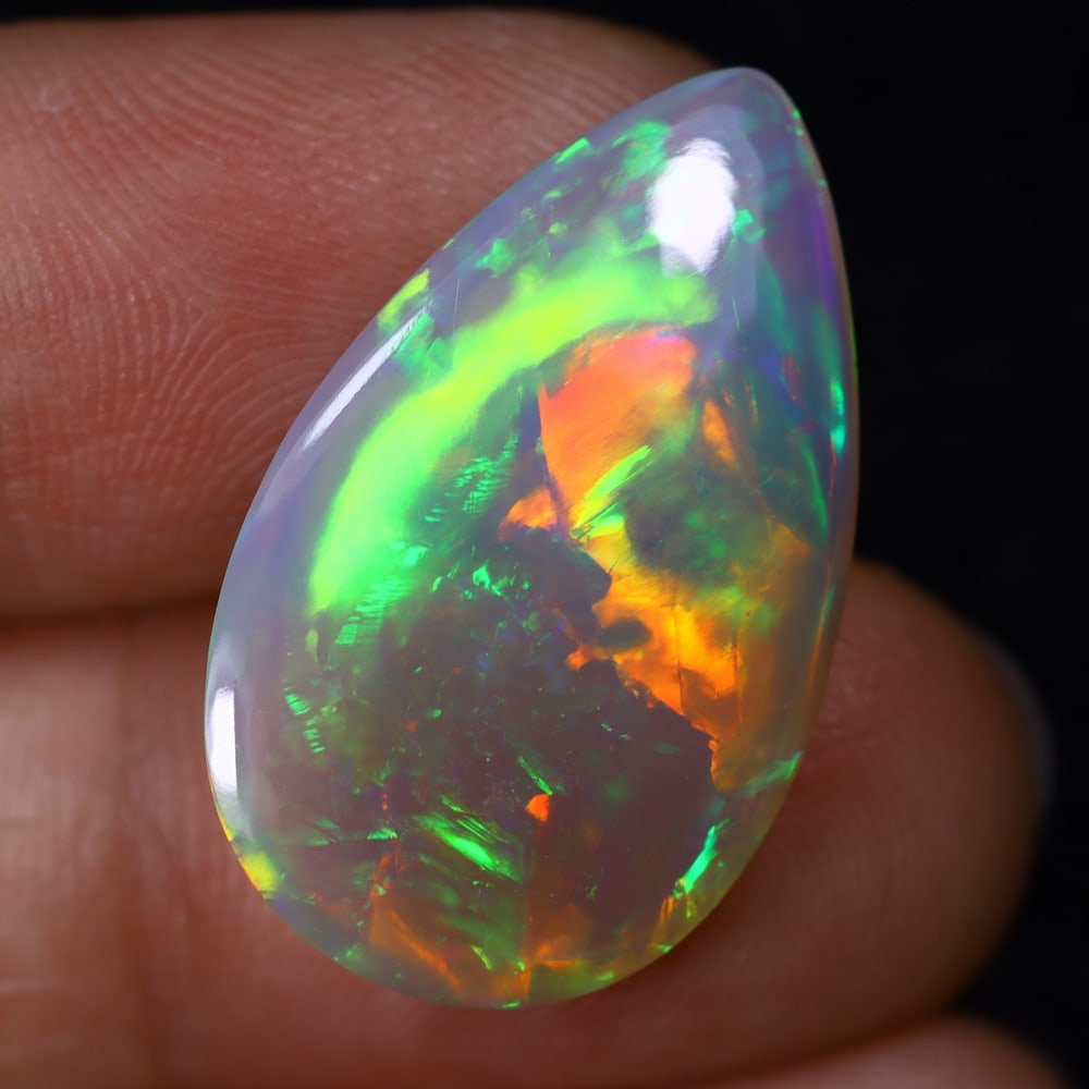 7.89Ct Natural Ethiopian Opal - 25.1x15.5x4.4 mm , 540C: Ksmith Heritage Auctioneers Subject: Natural Ethiopian Welo Opal Origin: Ethiopia Treatment: Unheated