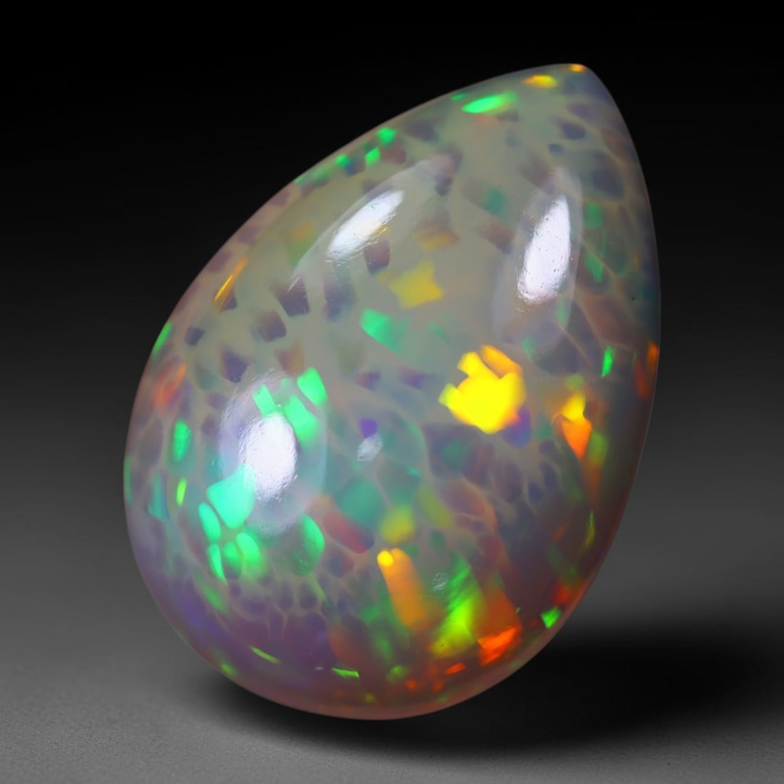 *14.96Ct Welo Opal Polished - Ethiopian Opal, 1179B: Ksmith Heritage Auctioneers Subject: Natural Ethiopian Welo Opal Origin: Ethiopia Carat Weight: 14.96Ct Dimension: 23.9x16.9x7.6 mm Treatment: Natural Untreated Type: Cabochon,