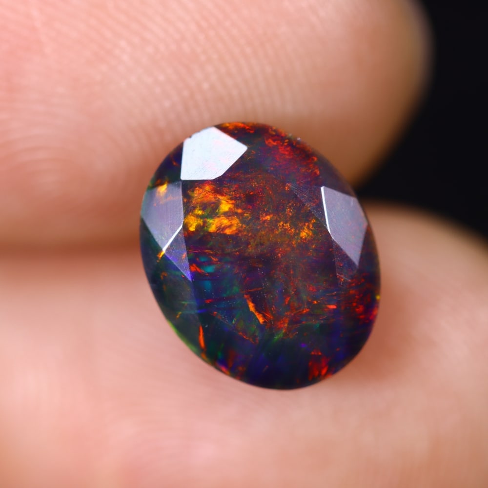 2.13Ct Ethiopian Black Smoked Opal, Faceted Cut - 10.4x8.5x5.9 mm , 621C: Ksmith Heritage Auctioneers Subject: Natural Ethiopian Welo Opal Origin: Ethiopia Treatment: Smoked