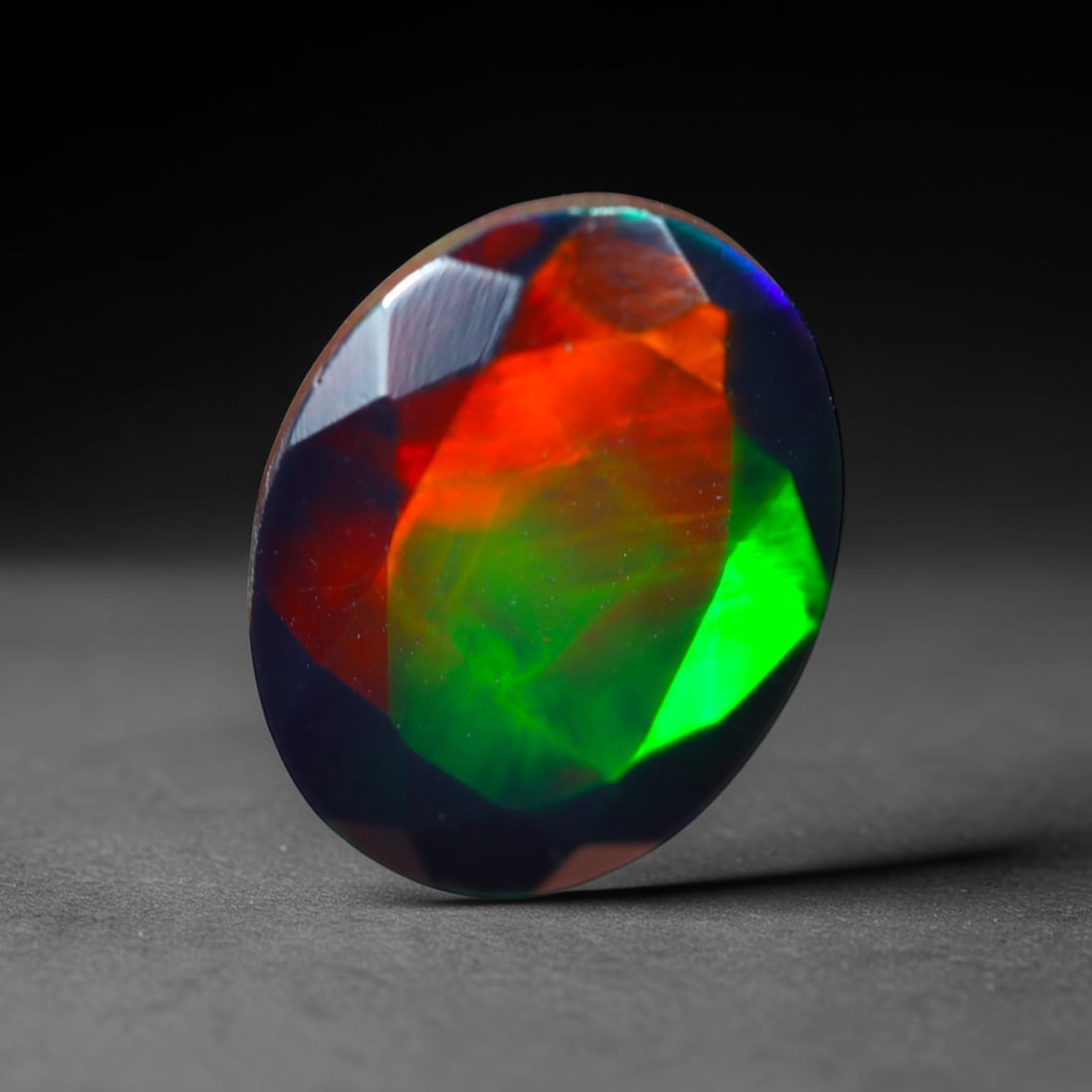 2.24Ct Natural Smoked Ethiopian Black Opal, Faceted Cut - 10.8x8.5x5.5 mm , 714C: Ksmith Heritage Auctioneers Subject: Natural Ethiopian Welo Opal Origin: Ethiopia Treatment: Smoked
